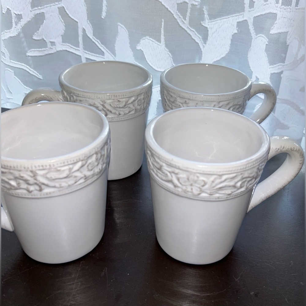 4 white Pfaltzgraff “Country Cupboard” mugs.